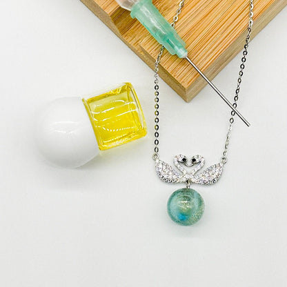 Sterling Silver Twin Swan Aroma Necklace - Aqua | Energy & Healing | Diffuse on the go | Perfect Gift - UrbanNest Co