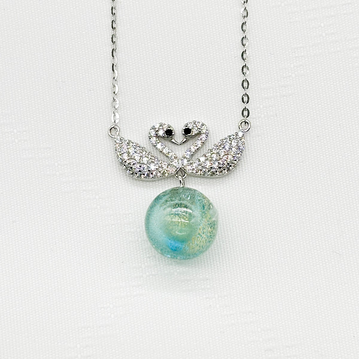 Sterling Silver Twin Swan Aroma Necklace - Aqua | Energy & Healing | Diffuse on the go | Perfect Gift - UrbanNest Co