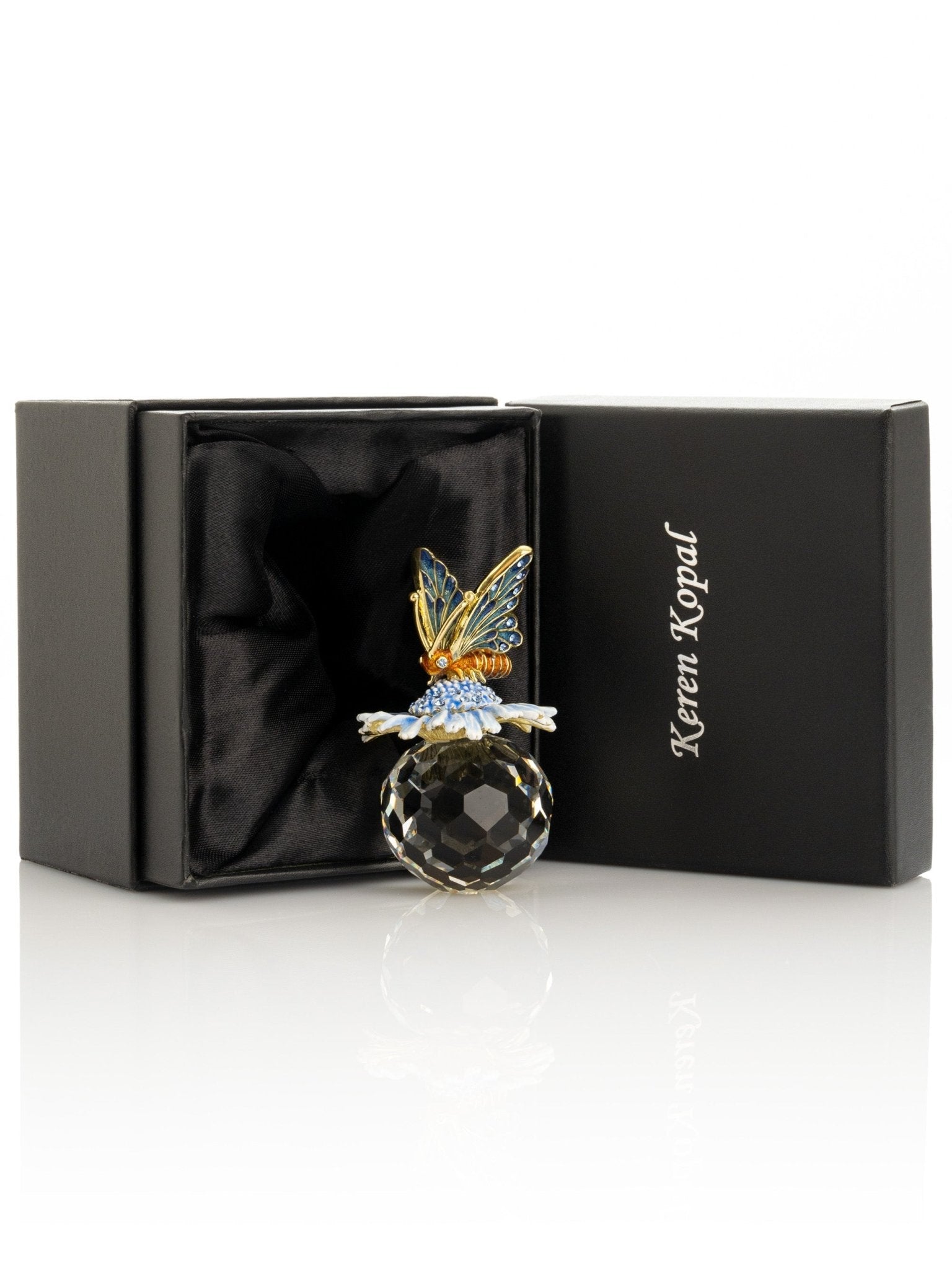 Butterfly sitting on Flower and Crystal - UrbanNest Co